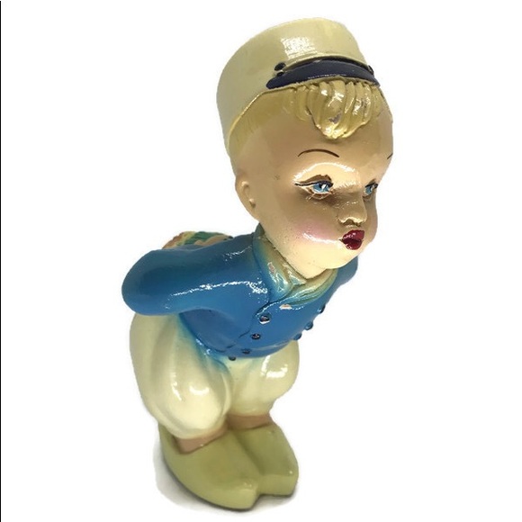 Antique Dutch Boy Kissing Figurine with flowers